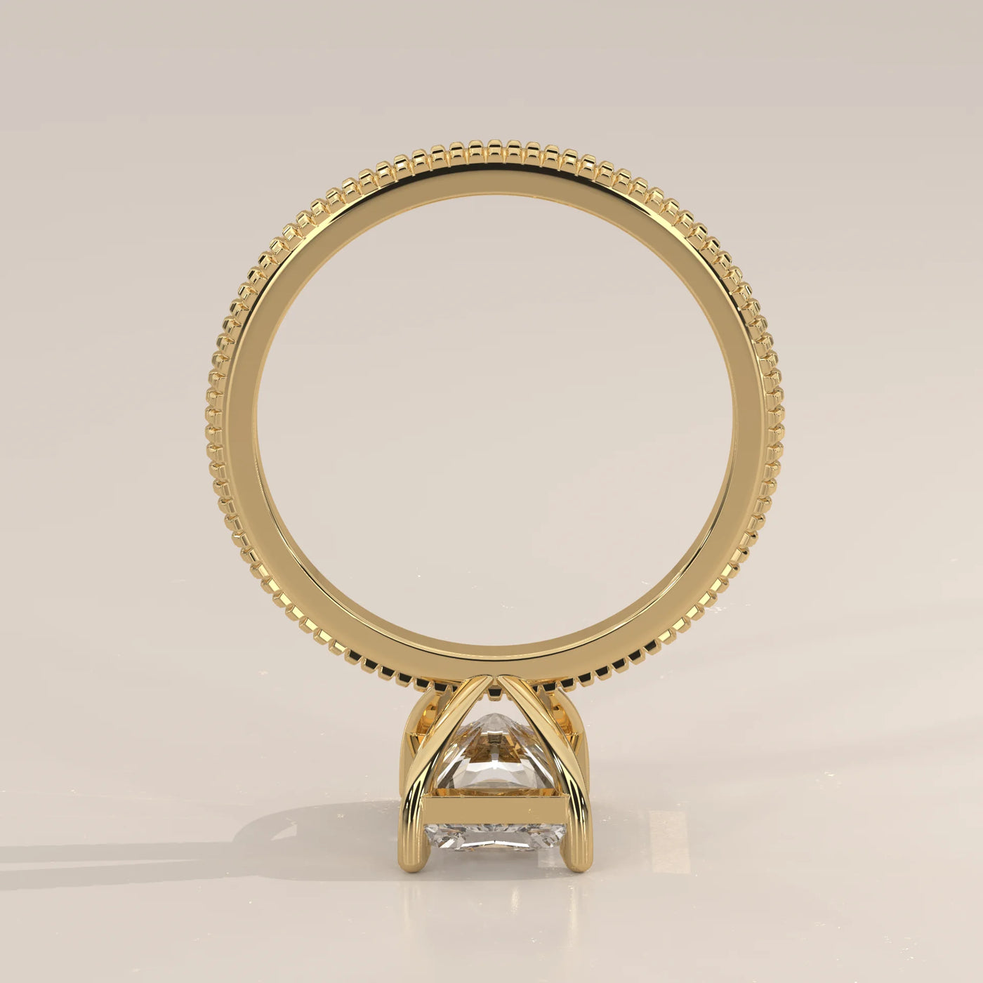 Yellow gold ring with a princess-cut diamond, set in a classic 4-prong setting.