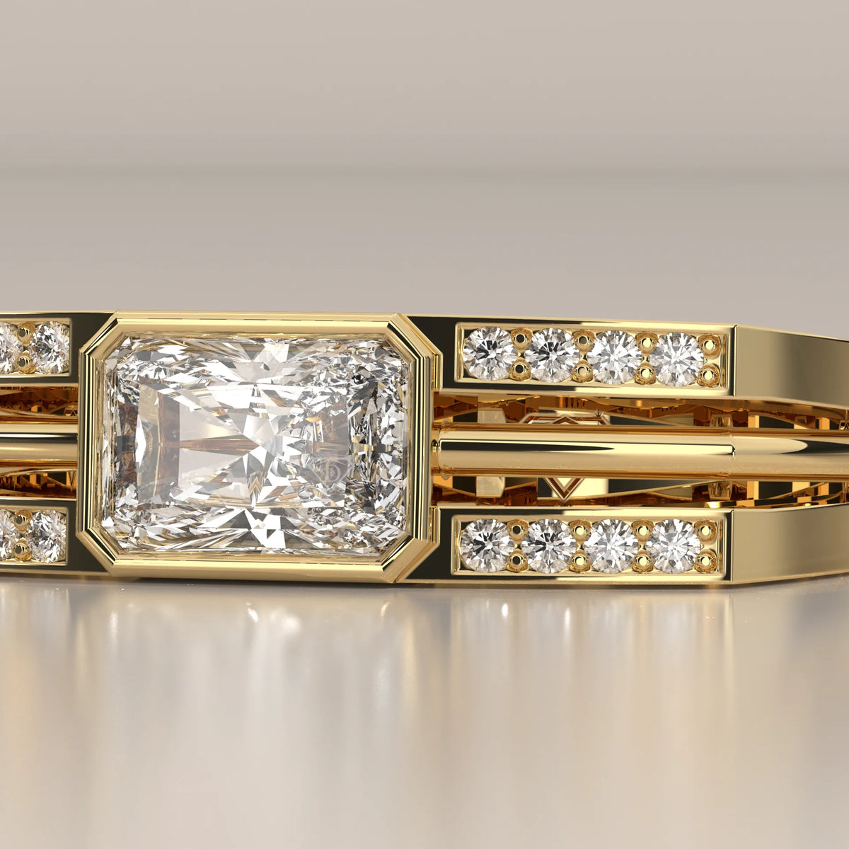 Radiant Lab Grown Diamond East West Bezel Ring with Split Rails in yellow gold, shown on a plain background.