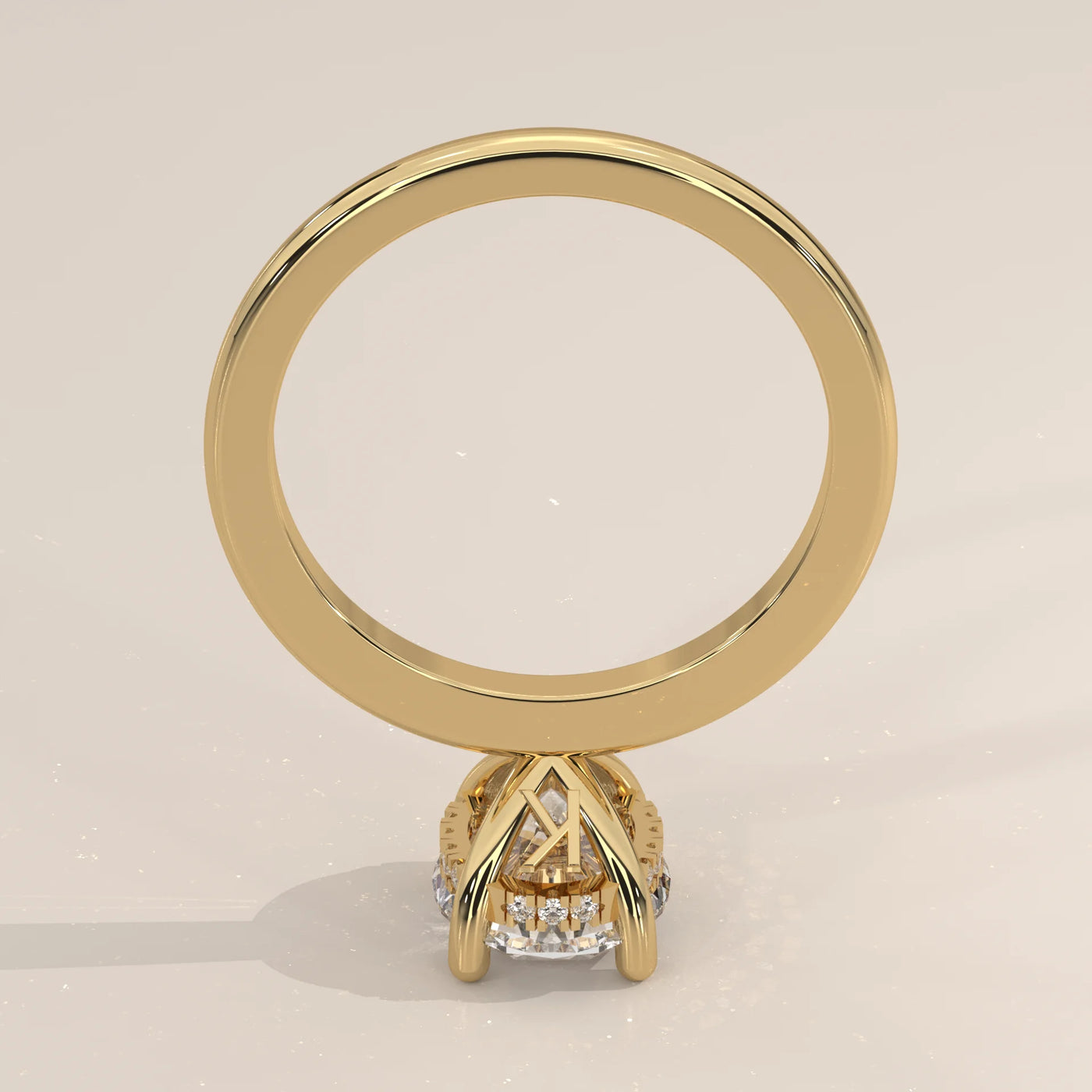 A detailed view of a 14k yellow gold ring with a central stone.
