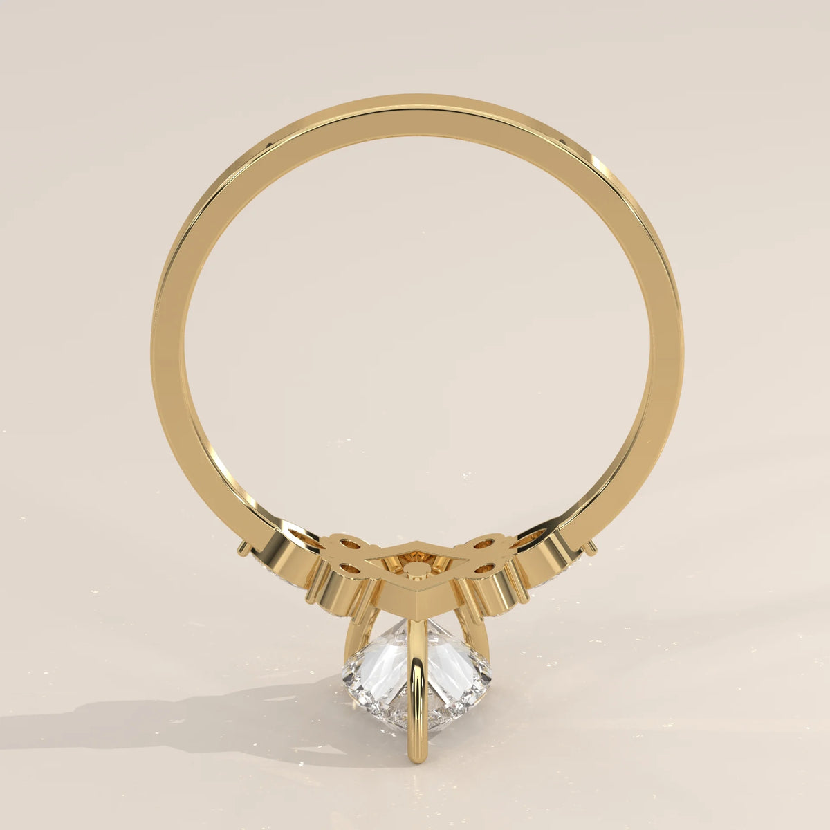 A detailed view of a 14k yellow gold ring with a central stone.