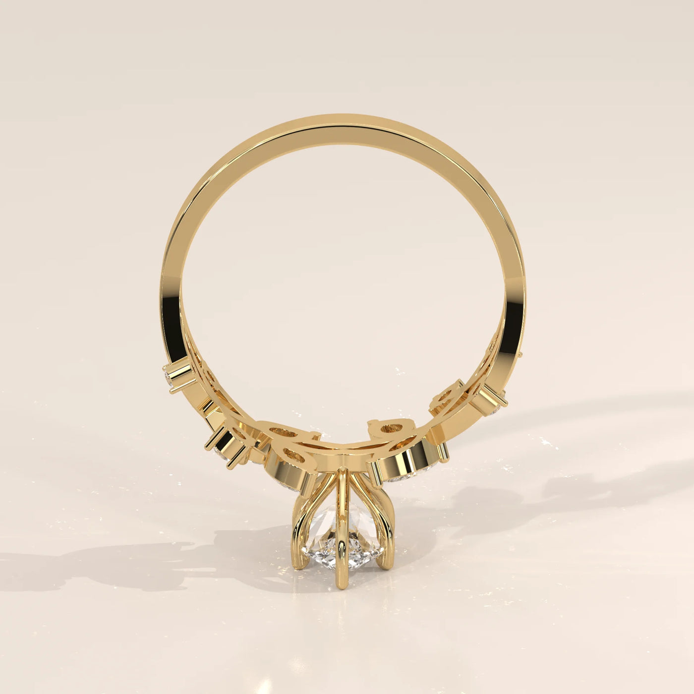 A classic 18k gold ring with a central diamond and smaller diamonds on the band.