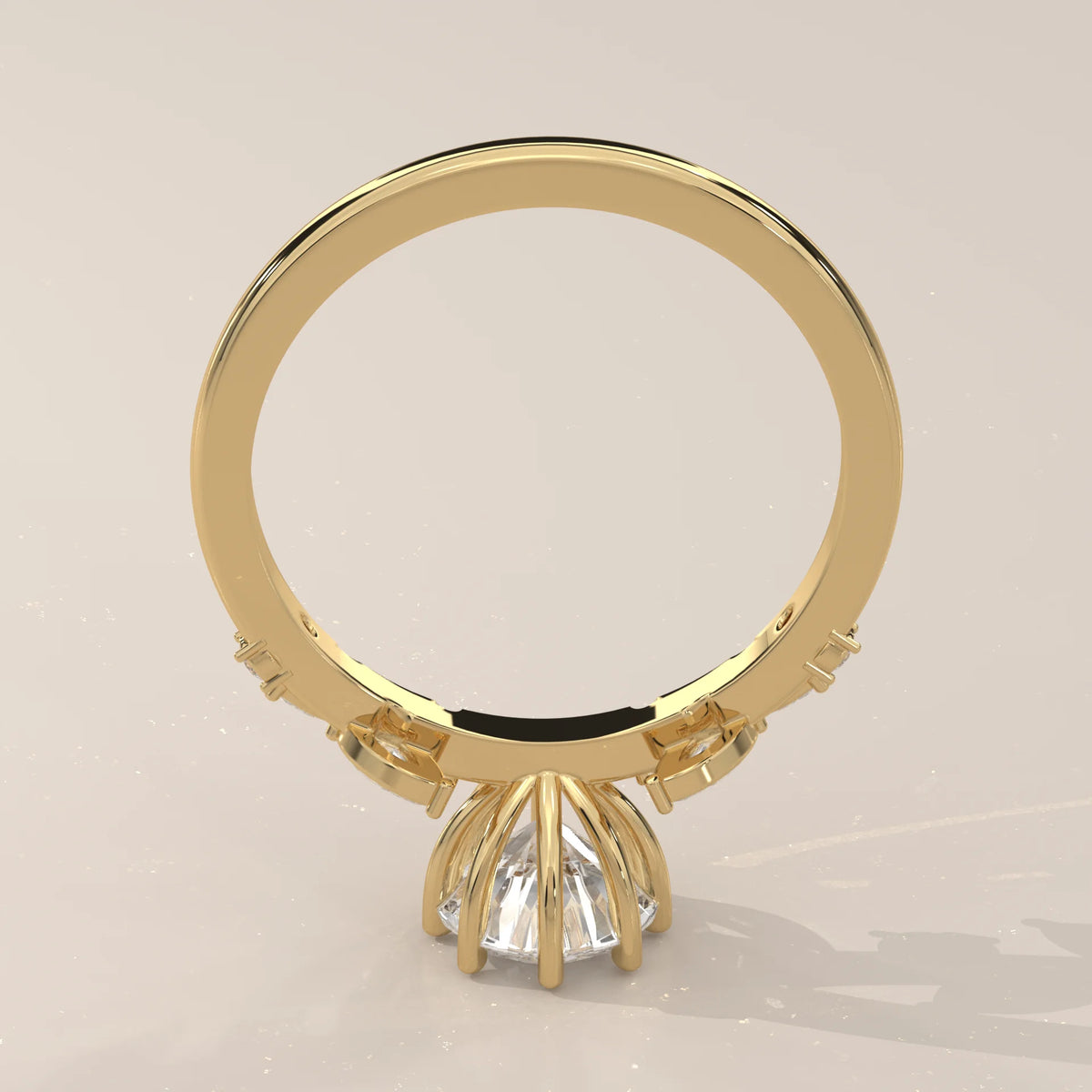 A classic 18k gold ring with a central diamond and smaller diamonds on the band.