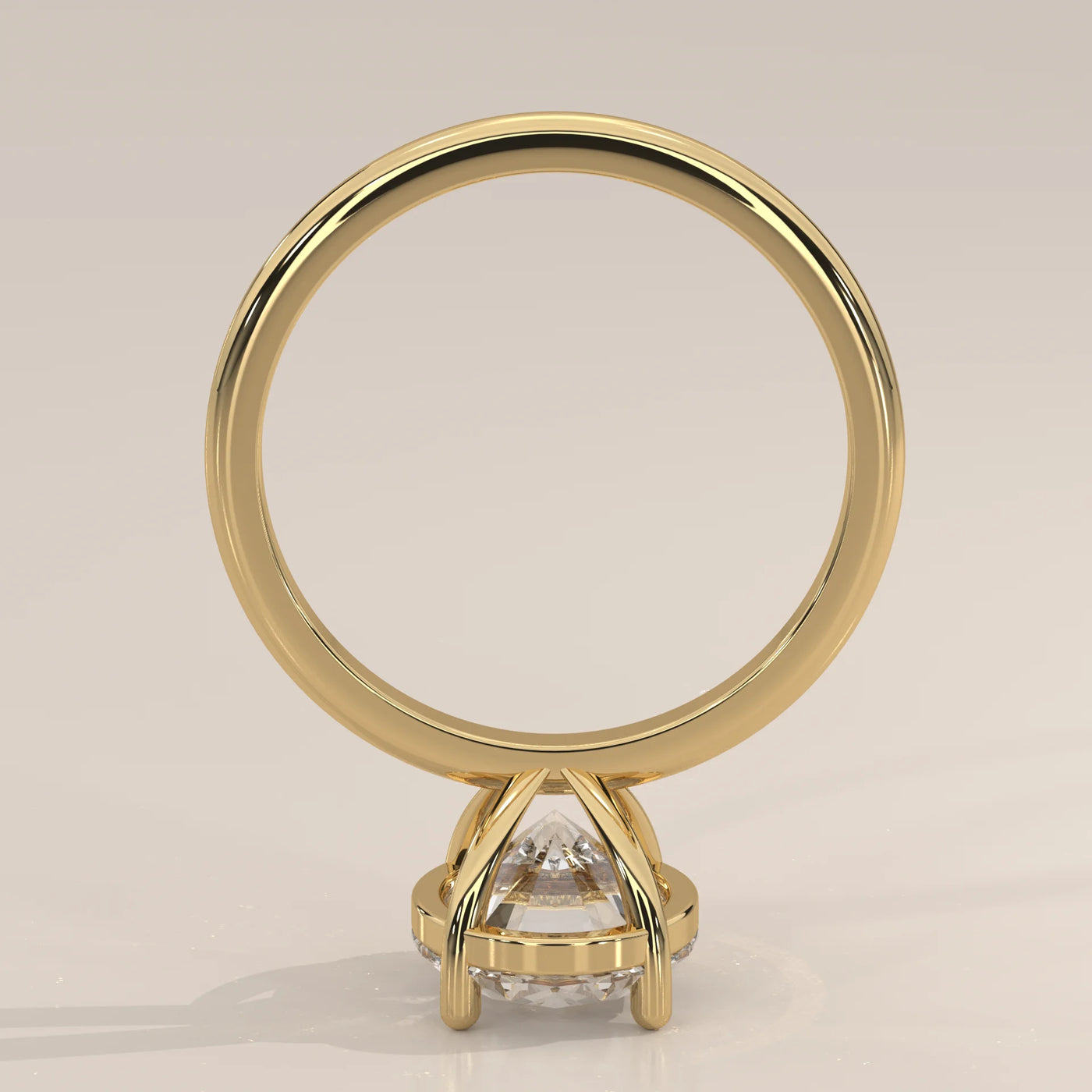 A yellow gold ring with a large diamond and small stones along the band.