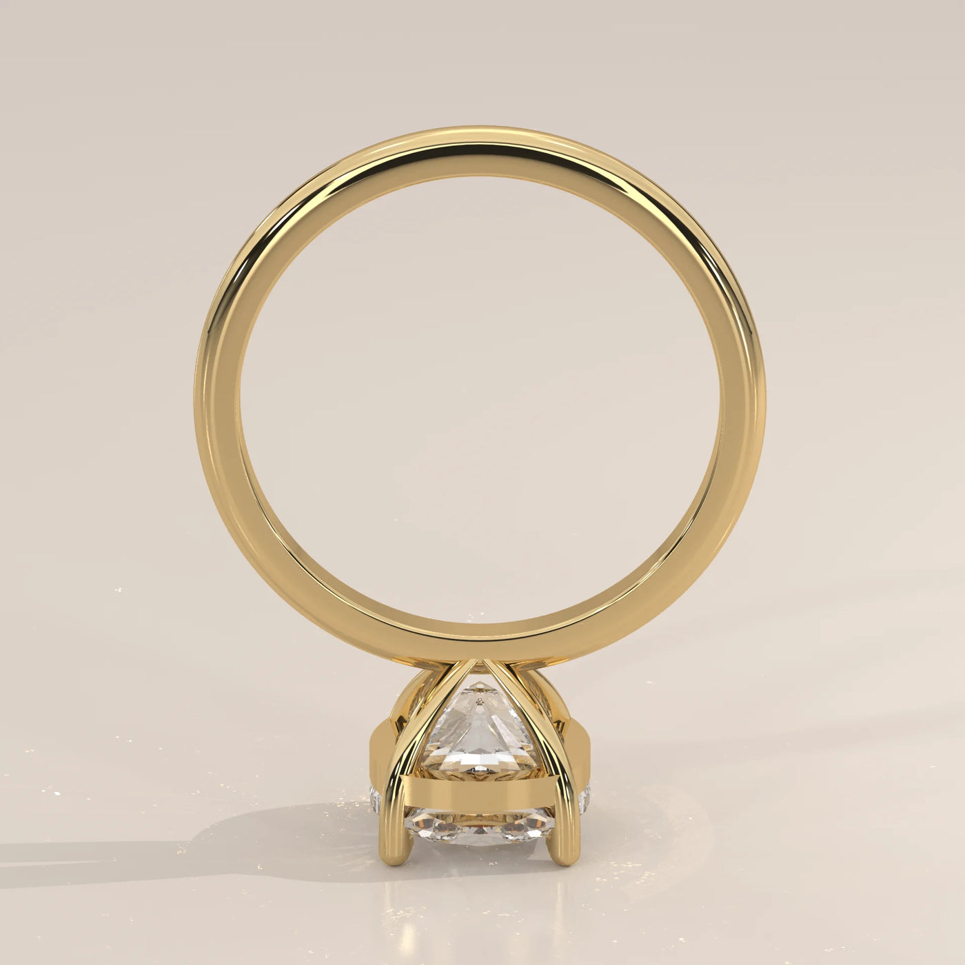 A yellow gold ring with a large diamond and small stones along the band.