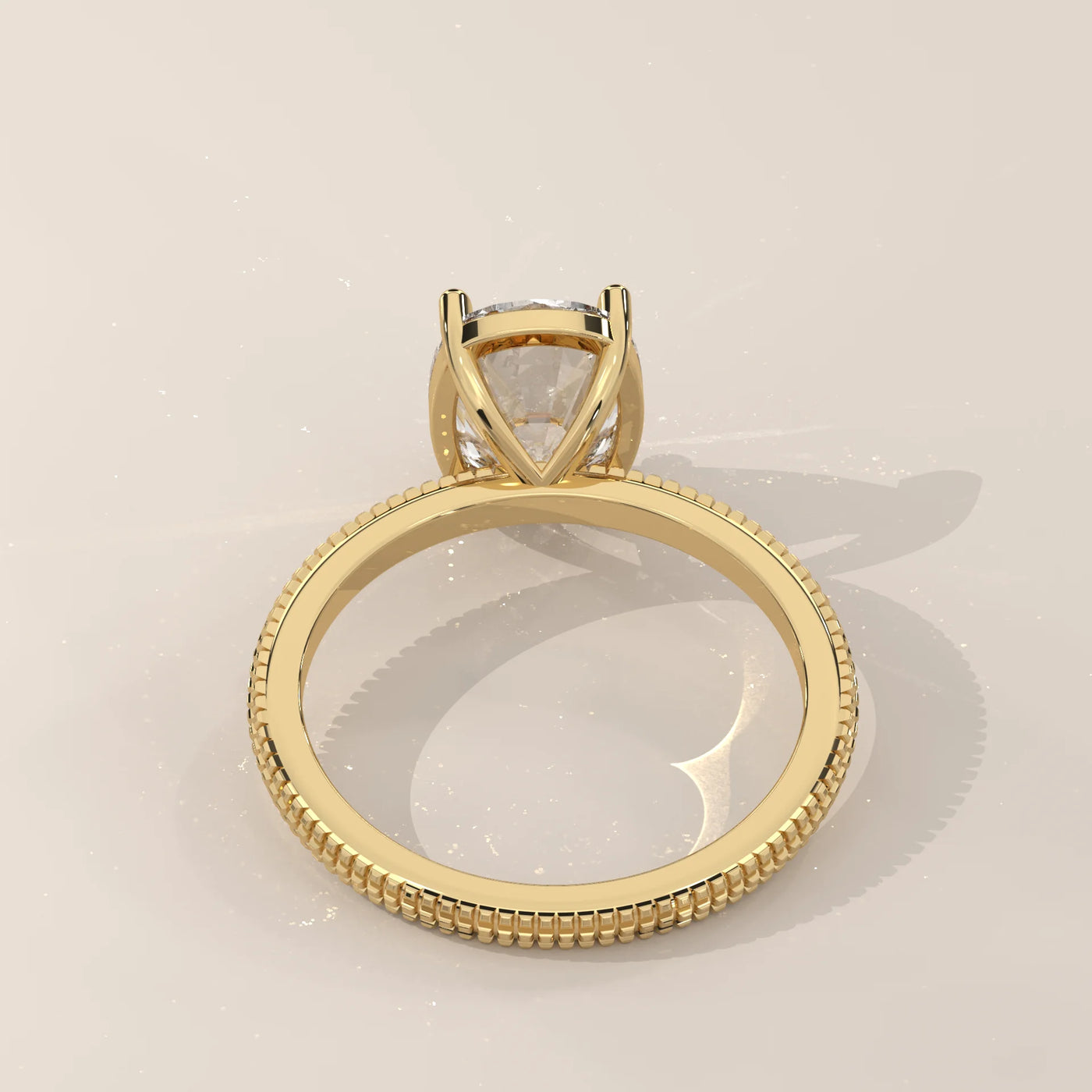 A 14k yellow gold ring with a large solitaire diamond.