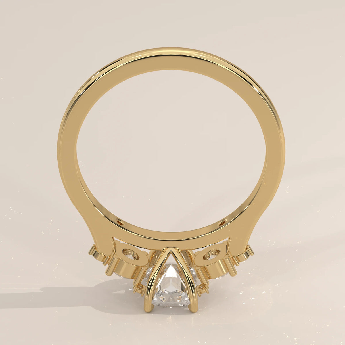 Gold ring with a trillion cut diamond and accent stones.