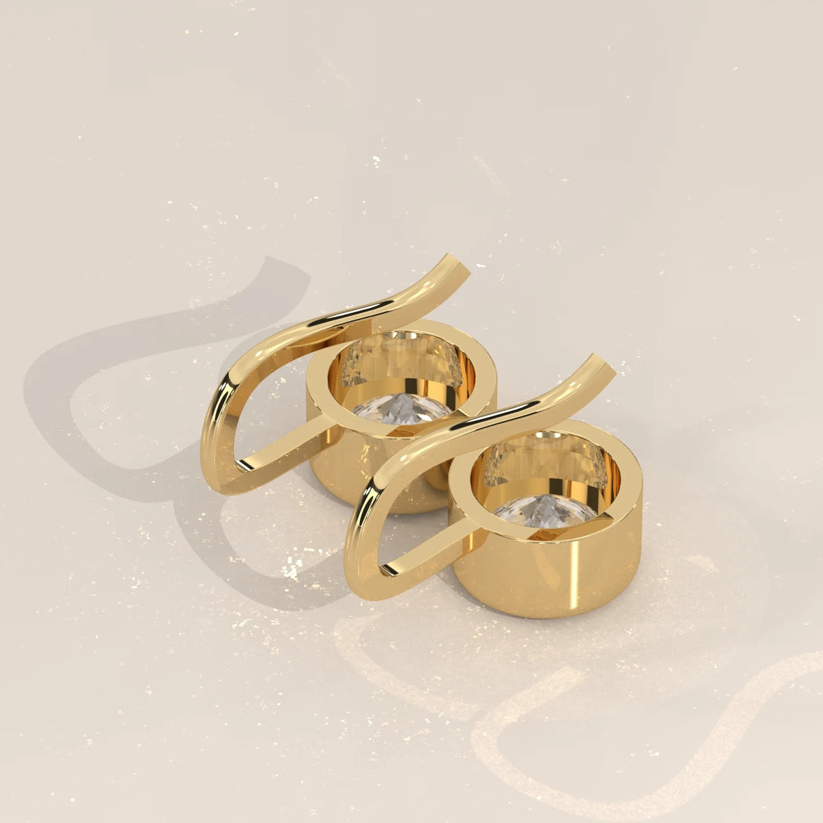 Round Bezel Set Lab Grown Diamond Drop Earrings on Gold Hook Wire in yellow gold, shown at an angle.