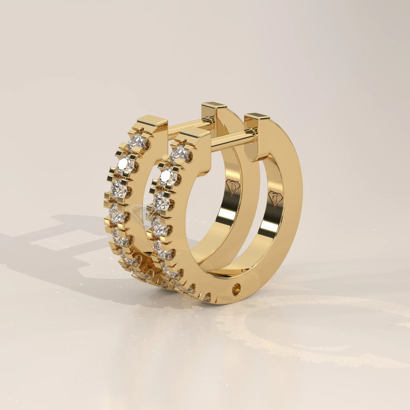 Three-Quarter View: Round Diamond Huggie Hoop Earrings with Prong Setting in Yellow Gold – Lab Grown – Driona Jewels