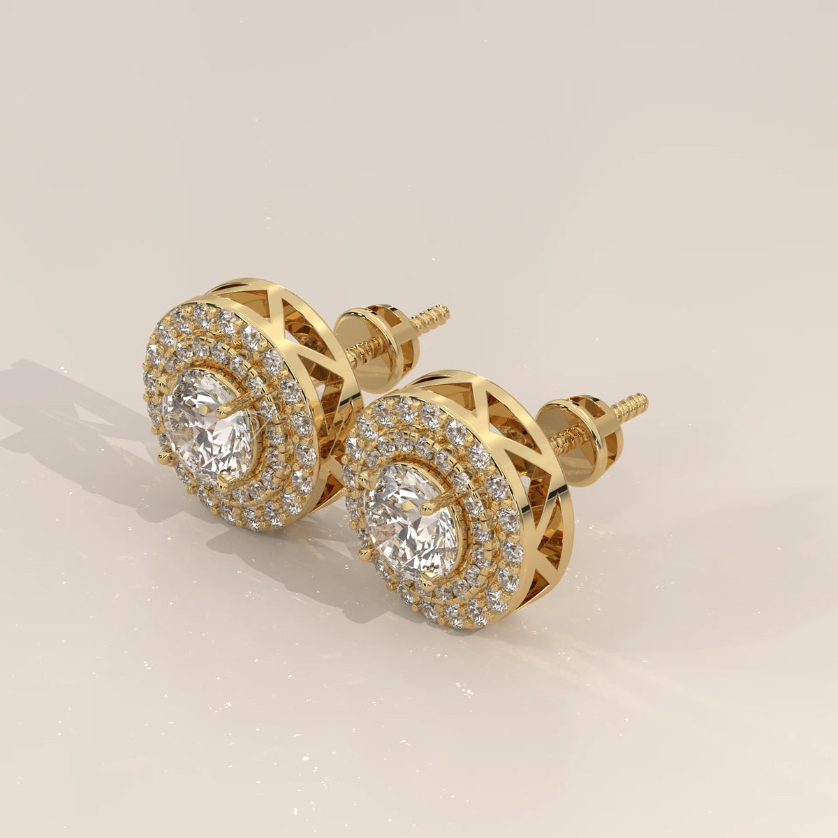 Round Double Halo Lab Grown Diamond Studs with Lattice Gallery in yellow gold, shown at an angle.