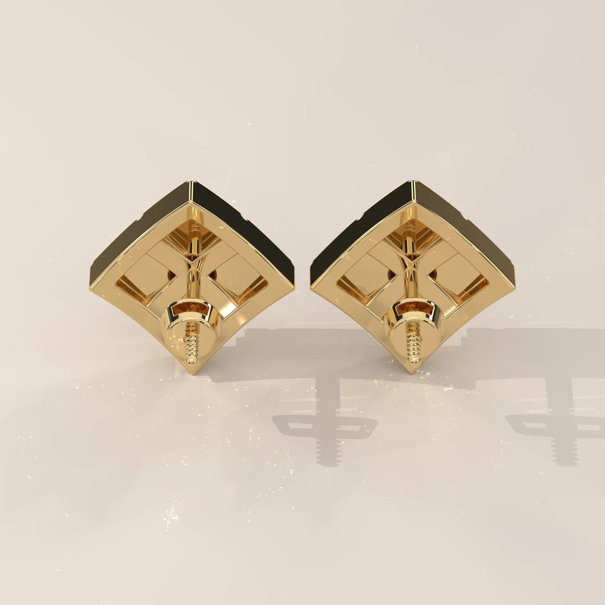 Round Lab Grown Diamond Studs on a Diamond Shaped Gold Plate in yellow gold, product photograph on a plain background.