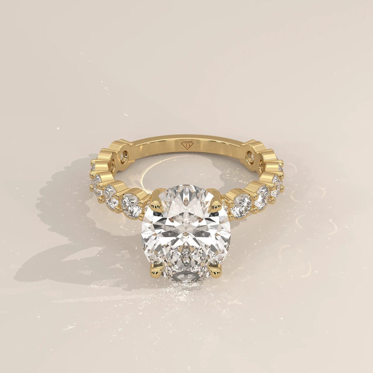 Scyrlet 5 Carat Oval Lab Grown Diamond Ring, Bold Round Diamond Band in yellow gold, shown from the front.