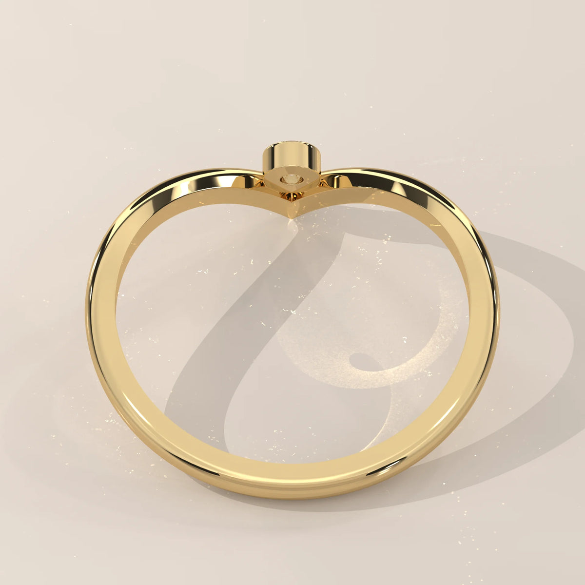 Sharp V Chevron Band with a Single Bezel Set Diamond in yellow gold, front view on a plain background.