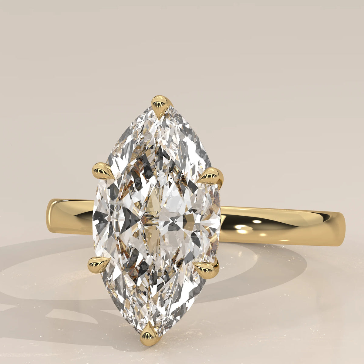 Stavia 5 Carat Marquise Lab Grown Diamond Solitaire, Hidden Halo in yellow gold, front view on a plain background.