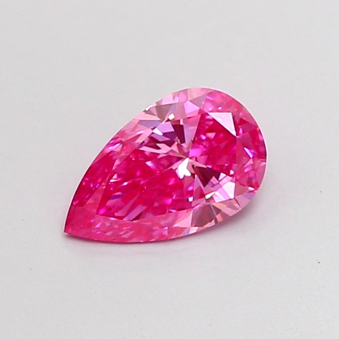 0.79 carat fancy vivid pink pear lab grown diamond VS1 clarity