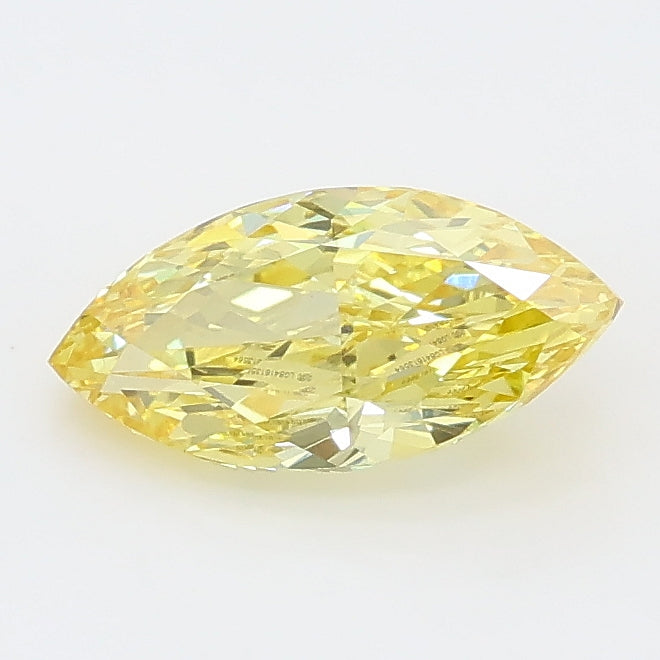 0.95 carat fancy vivid yellow marquise lab grown diamond VS1 clarity