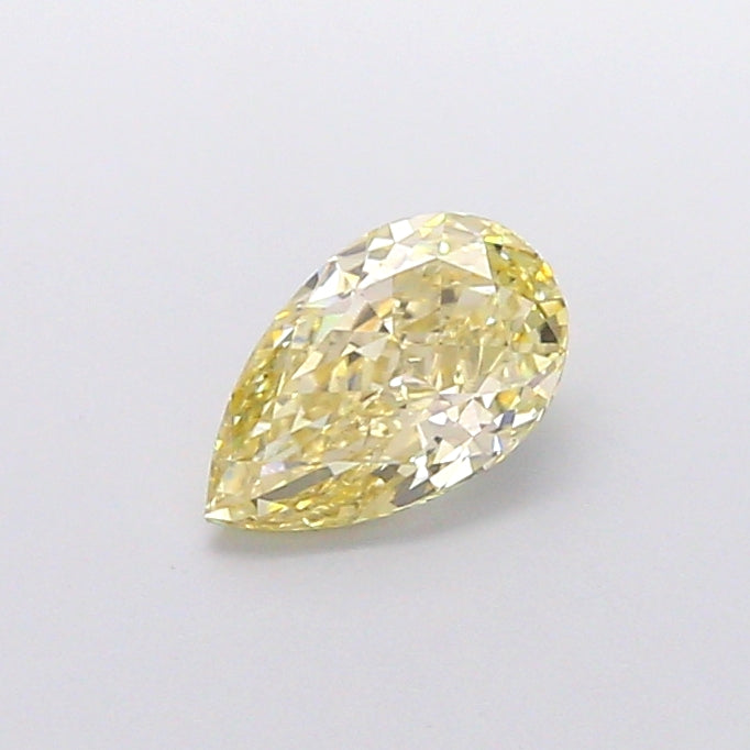 1.05 carat fancy yellow pear lab grown diamond VVS1 clarity