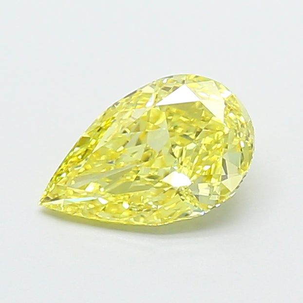 0.86 carat fancy vivid yellow pear lab grown diamond VVS2 clarity