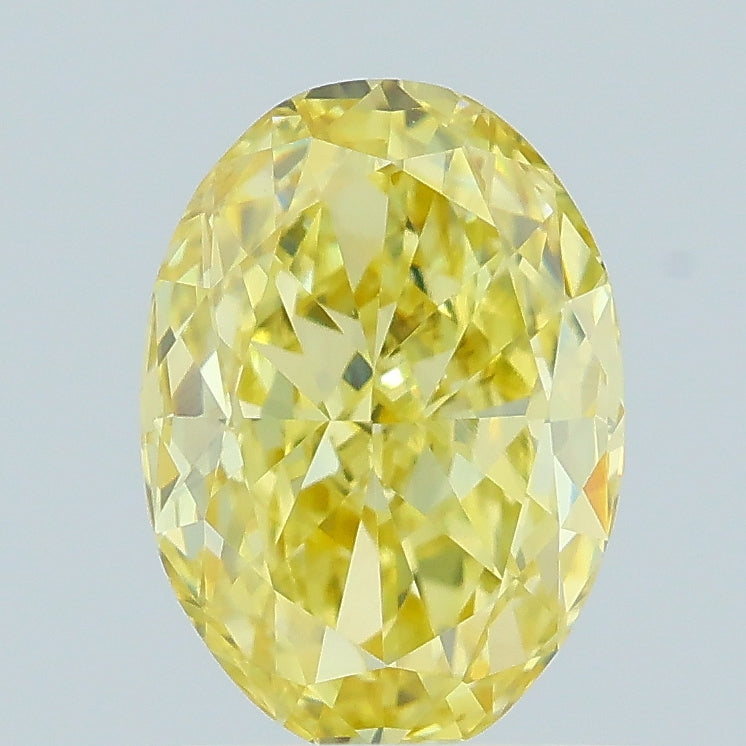 0.97 carat fancy intense yellow oval lab grown diamond VVS2 clarity