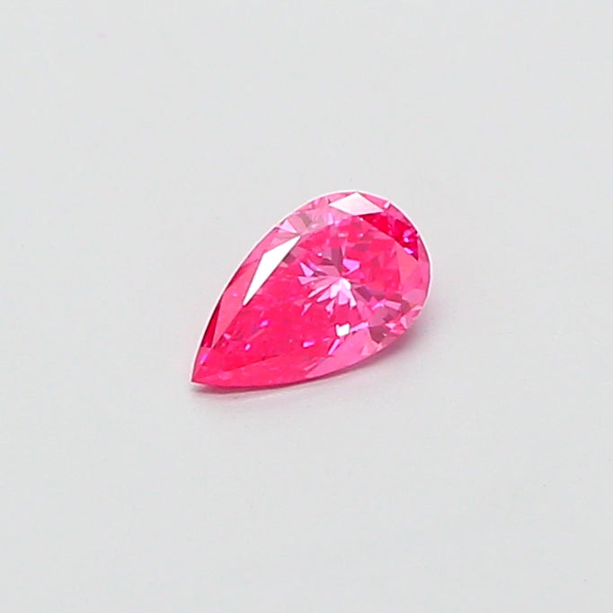 0.41 carat fancy vivid pink pear lab grown diamond VS1 clarity
