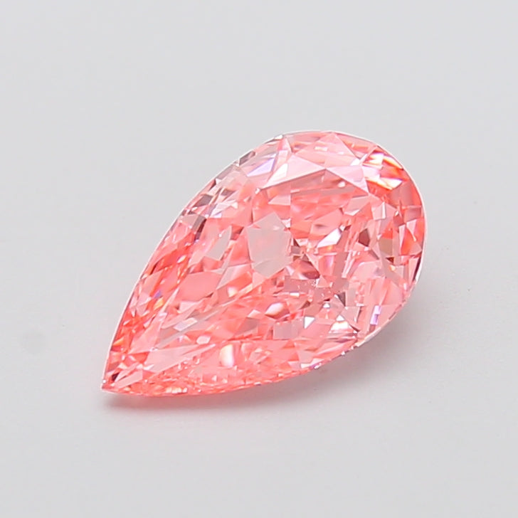 2.01 carat fancy vivid orangey pink pear lab grown diamond VVS2 clarity