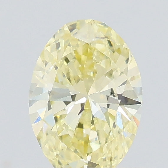 0.39 carat light yellow oval lab grown diamond VS1 clarity