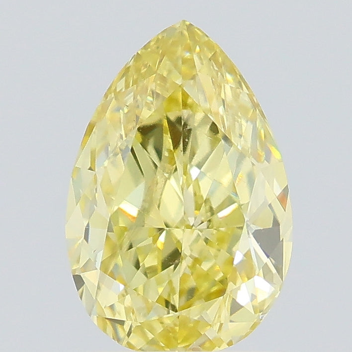 0.77 carat fancy yellow pear lab grown diamond SI1 clarity