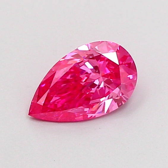 0.58 carat fancy vivid pink pear lab grown diamond VS1 clarity