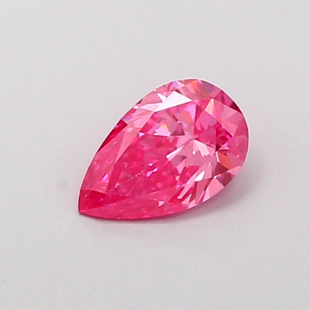 0.43 carat fancy vivid pink pear lab grown diamond VS1 clarity