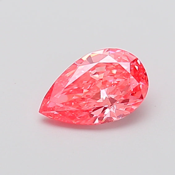 0.79 carat fancy vivid pink pear lab grown diamond VS1 clarity