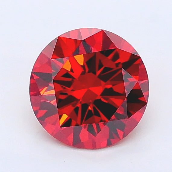0.98 carat fancy vivid brownish orange round lab grown diamond VVS2 clarity