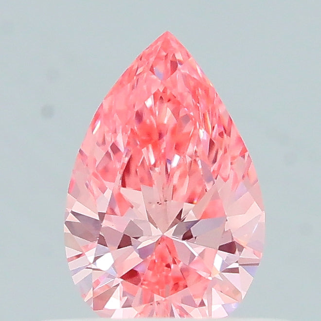 0.41 carat fancy vivid pink pear lab grown diamond VS1 clarity