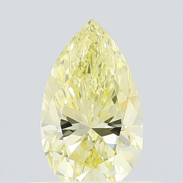 0.39 carat fancy yellow pear lab grown diamond VS1 clarity