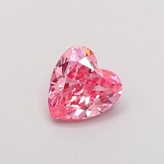 0.65 carat fancy vivid pink heart lab grown diamond VVS2 clarity