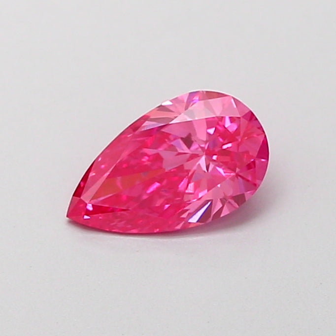 0.74 carat fancy vivid pink pear lab grown diamond VS1 clarity
