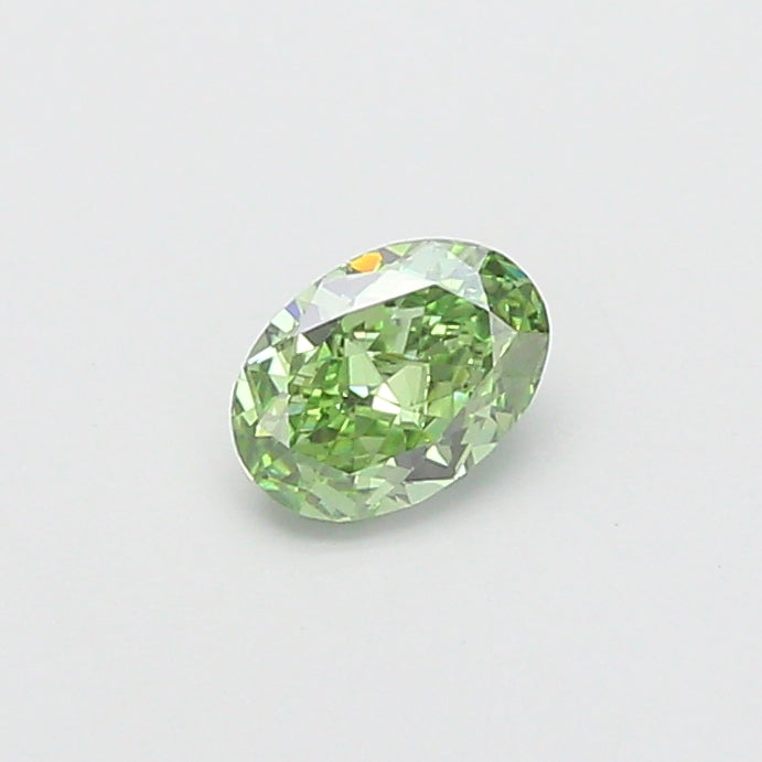 0.60 carat fancy vivid green oval lab grown diamond VVS2 clarity