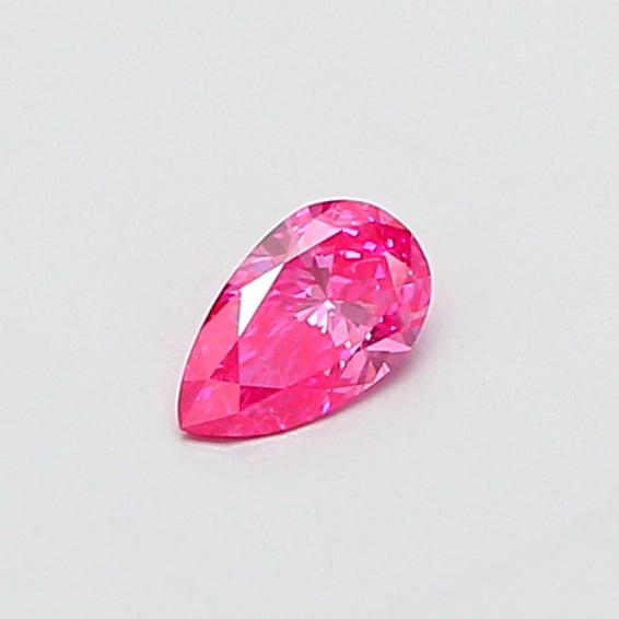 0.32 carat fancy vivid pink pear lab grown diamond SI1 clarity