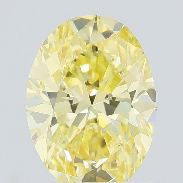 0.65 carat fancy yellow oval lab grown diamond VS2 clarity