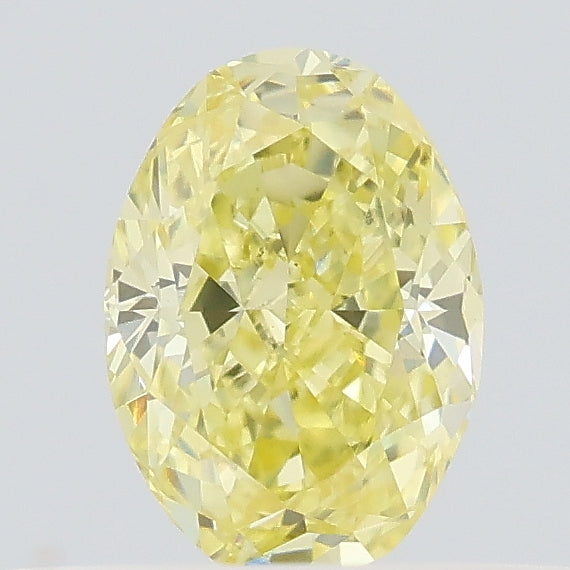 0.38 carat fancy intense yellow oval lab grown diamond VS1 clarity