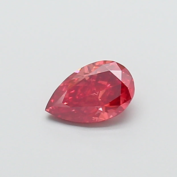0.77 carat fancy vivid pink pear lab grown diamond VS2 clarity