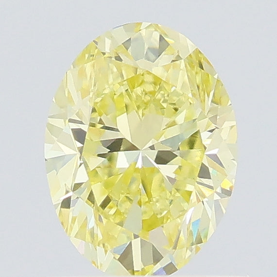 0.77 carat fancy intense yellow oval lab grown diamond VVS2 clarity