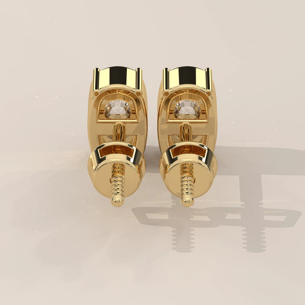 Pair of gold stud earrings with diamonds, viewed from the front.