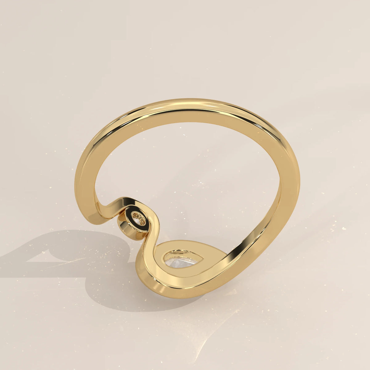 Pear Lab Grown Diamond Swirl Ring with Bezel Set Round Accent in yellow gold, shown on a plain background.