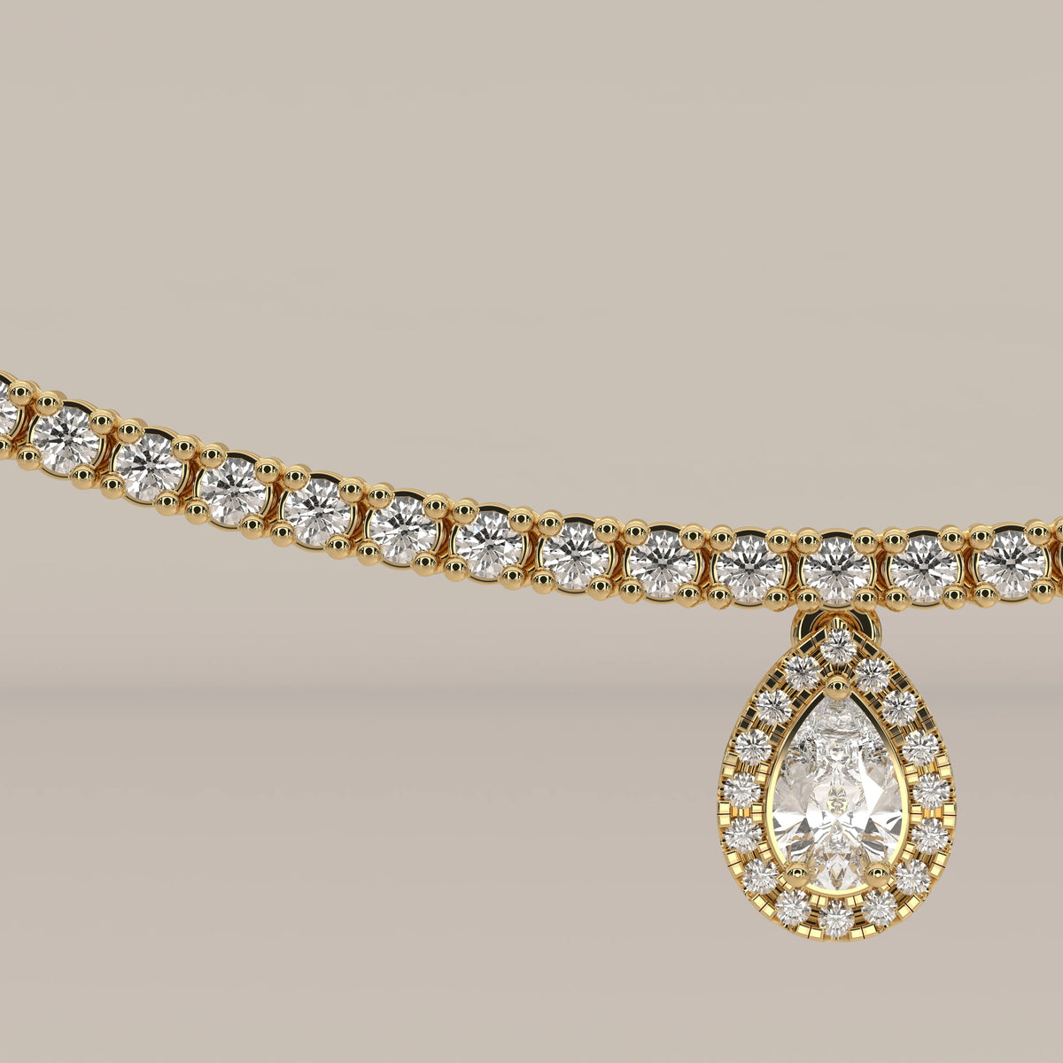 A pear halo lab grown diamond teardrop tennis necklace in yellow gold, product photograph on a plain background.