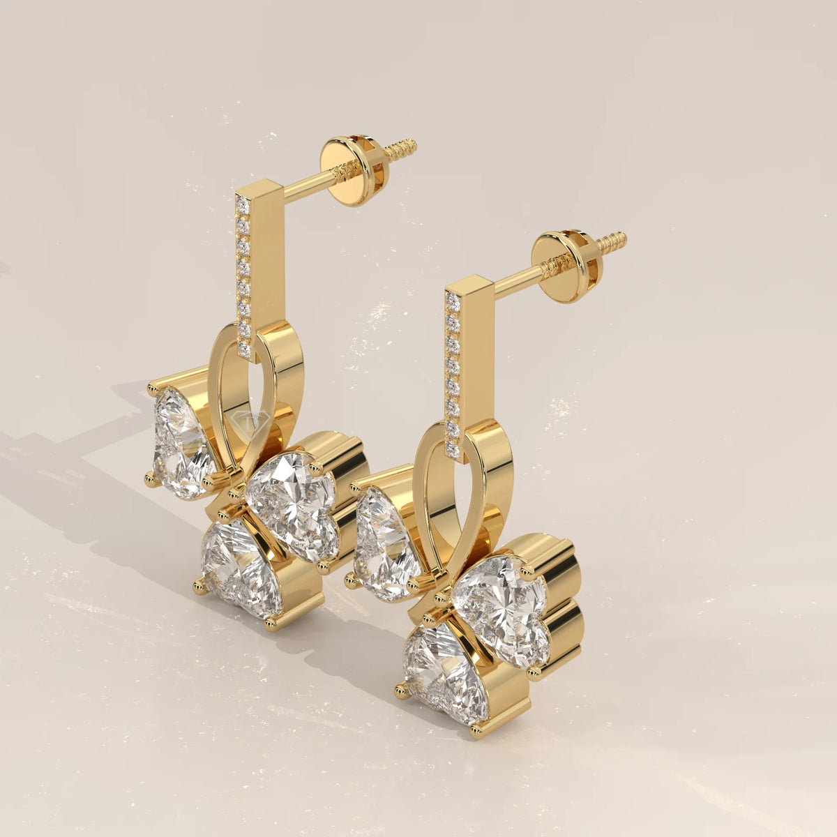 Three Heart Lab Grown Diamond Clover Drop Earrings with Pave Bar in yellow gold, shown from the side.