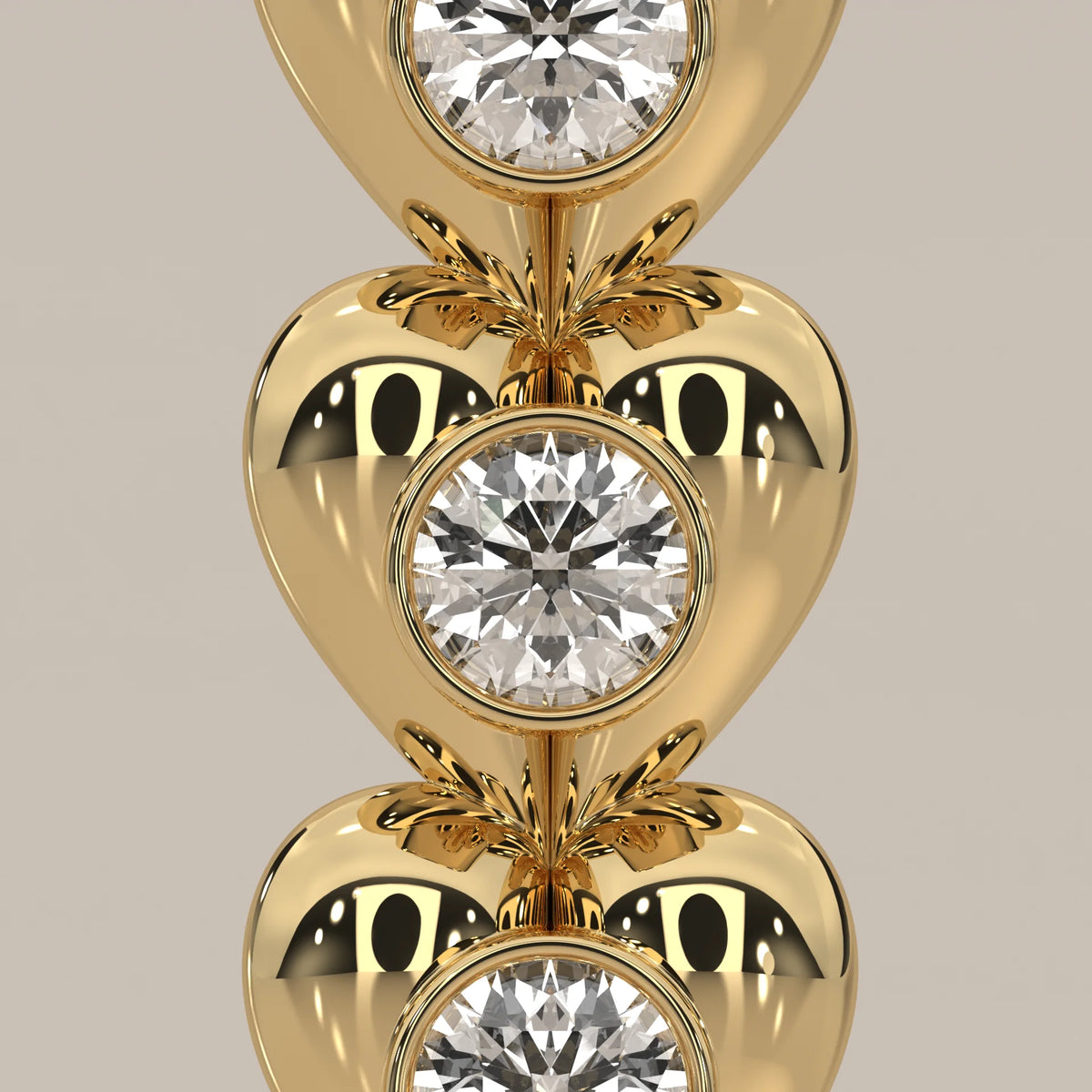 Three Puffed Heart Lab Grown Diamond Drop Pendant with Bezel Rounds in yellow gold, shown on a plain background.