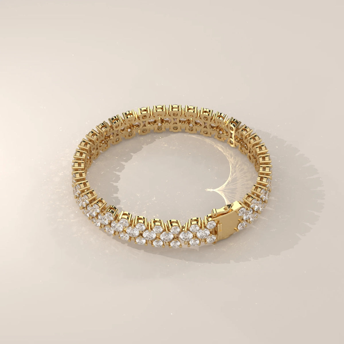 Three Row Round Lab Grown Diamond Cluster Tennis Bracelet in yellow gold, product photograph on a plain background.