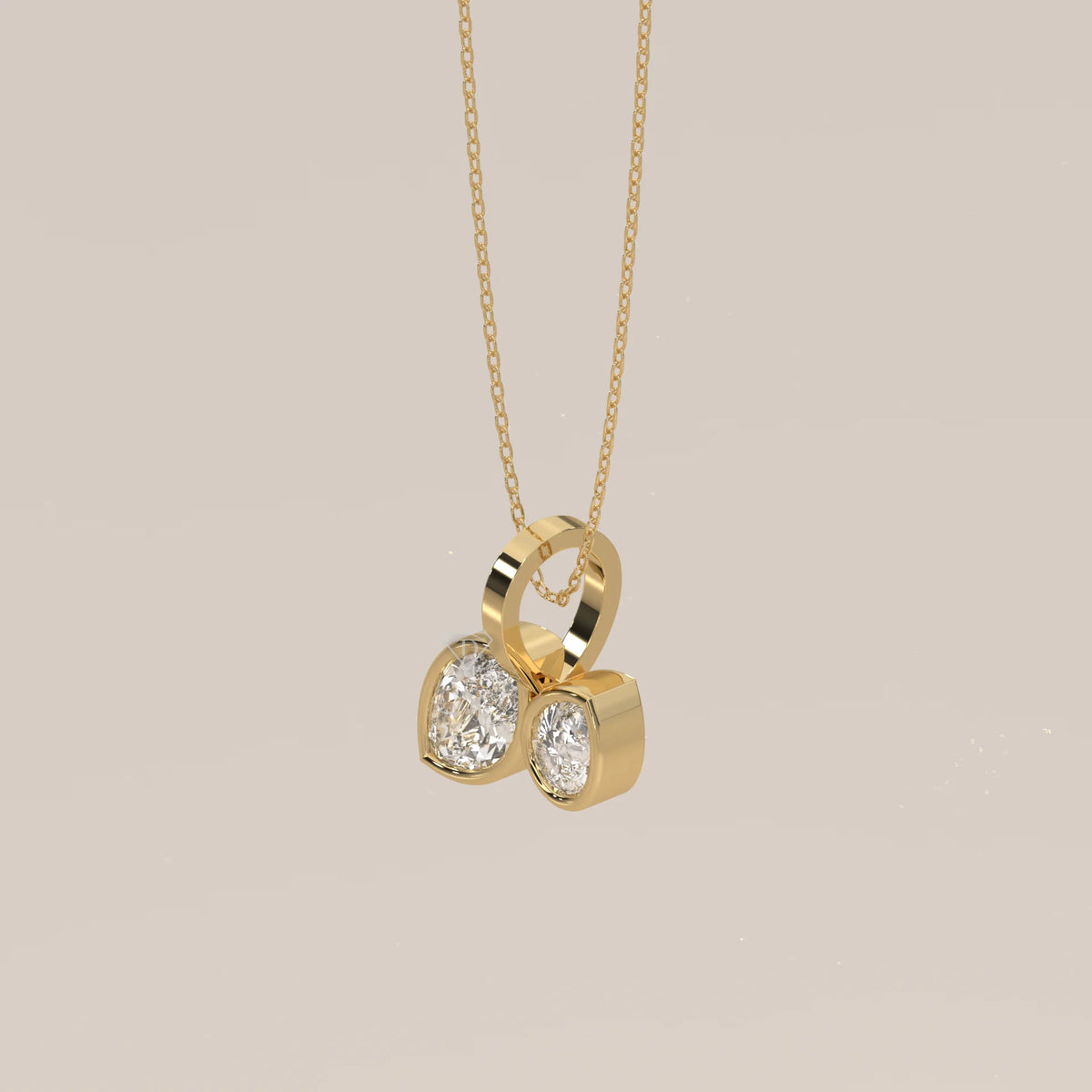 Toi et Moi Bezel Marquise and Pear Lab Grown Diamond Pendant in yellow gold, photographed head-on.