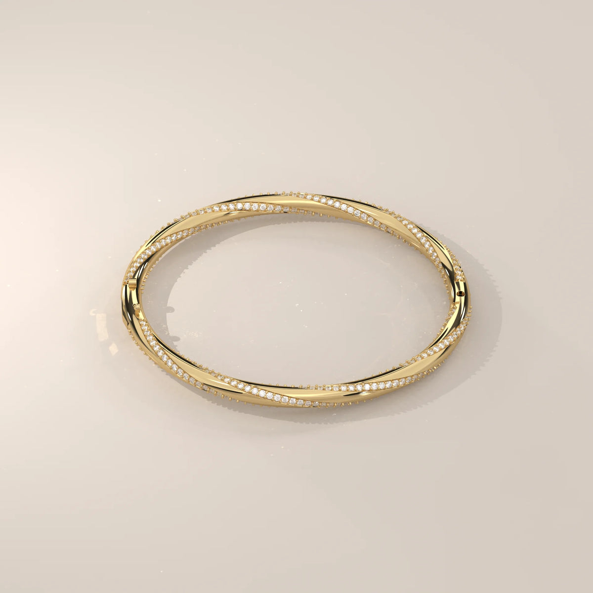 Twisted Pave Lab Grown Diamond Hinged Bangle with Polished Band in yellow gold, shown on a plain background.