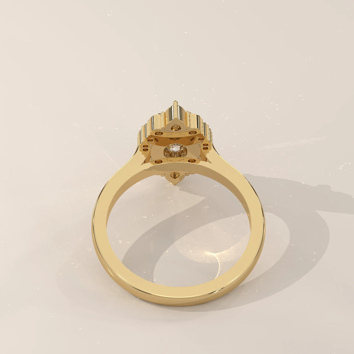 Oval Lab Grown Diamond Halo Ring with Pear Tips at Top and Base in yellow gold, shown on a plain background.