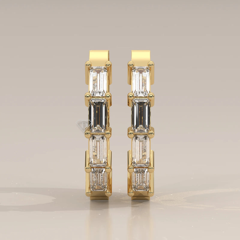 Front View: Baguette Diamond Huggie Hoop Earrings with Prong Setting in Yellow Gold – Lab Grown – Driona Jewels